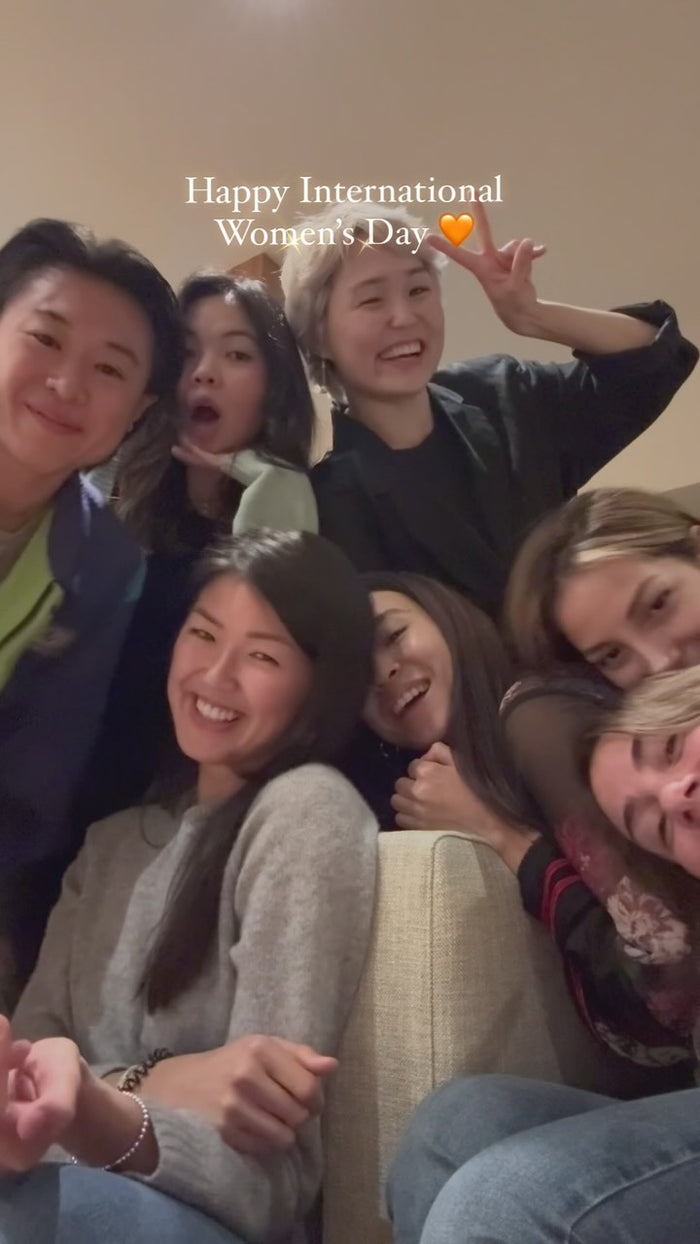 Lin laughing with a group of women friends